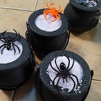 Bath bombs in cauldrons for Halloween.